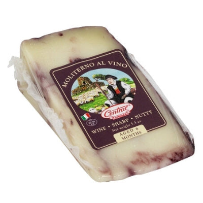 Assorted Central Italian cheeses including Pecorino Romano and Caciotta on a wooden board