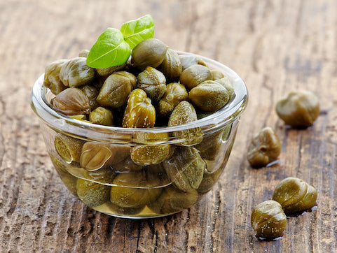 Gourmet Italian and Mediterranean capers in brine and sea salt, ideal for pasta and antipasti