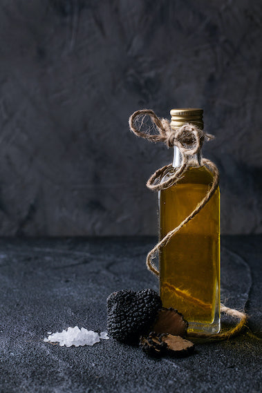 Selection of gourmet truffle products including truffle oils, sauces, and Italian delicacies